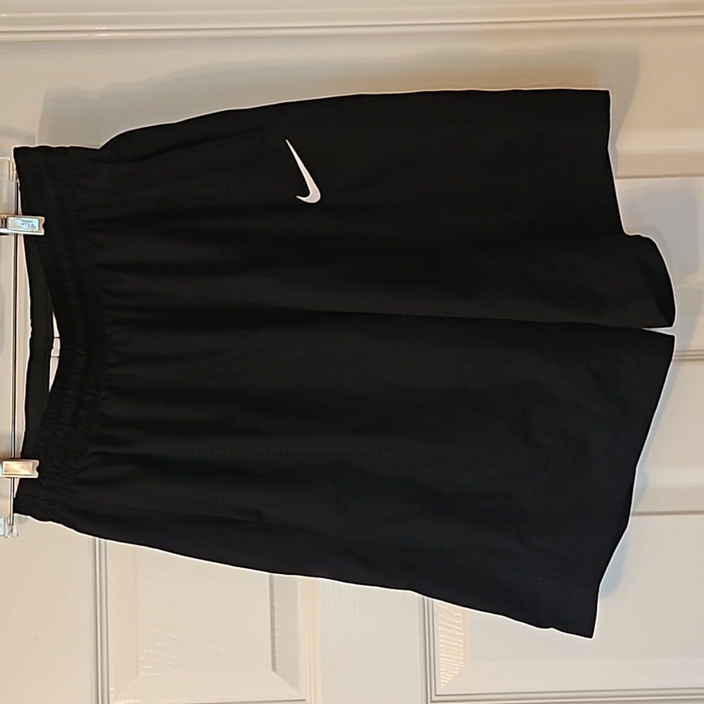 Nike boys size medium basketball shorts, color is black